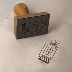 Stempel Ex-libris Vogel auf Buch